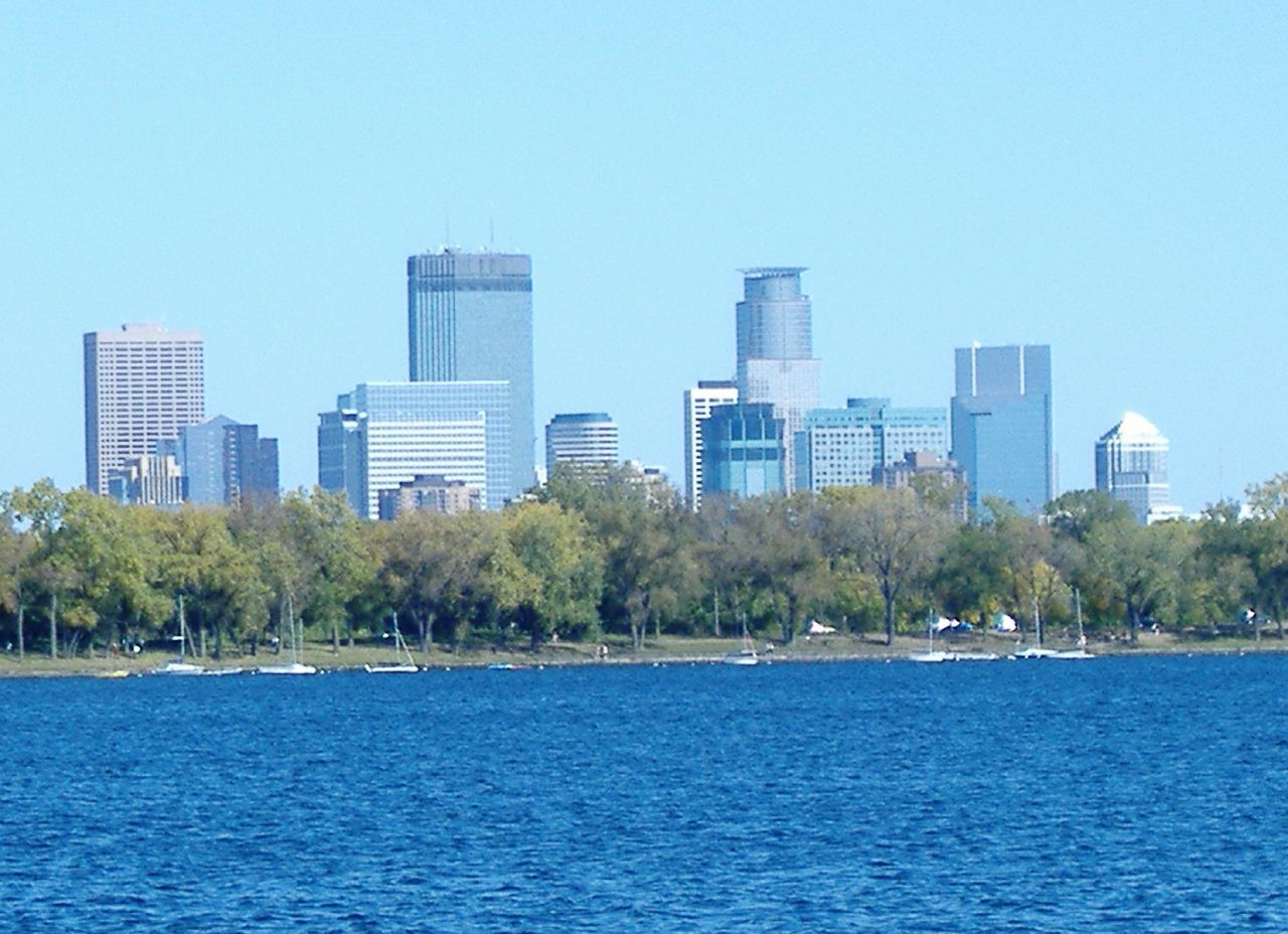 Downtown Minneapolis skyline seen across Bde Maka Ska