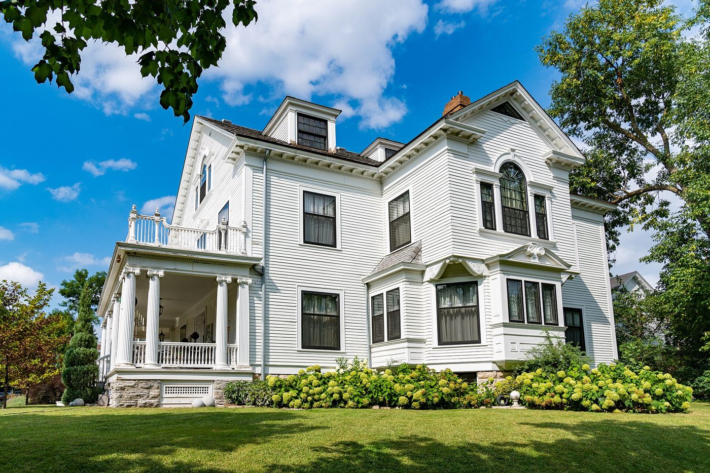 Historic white frame house in Lowry Hill East